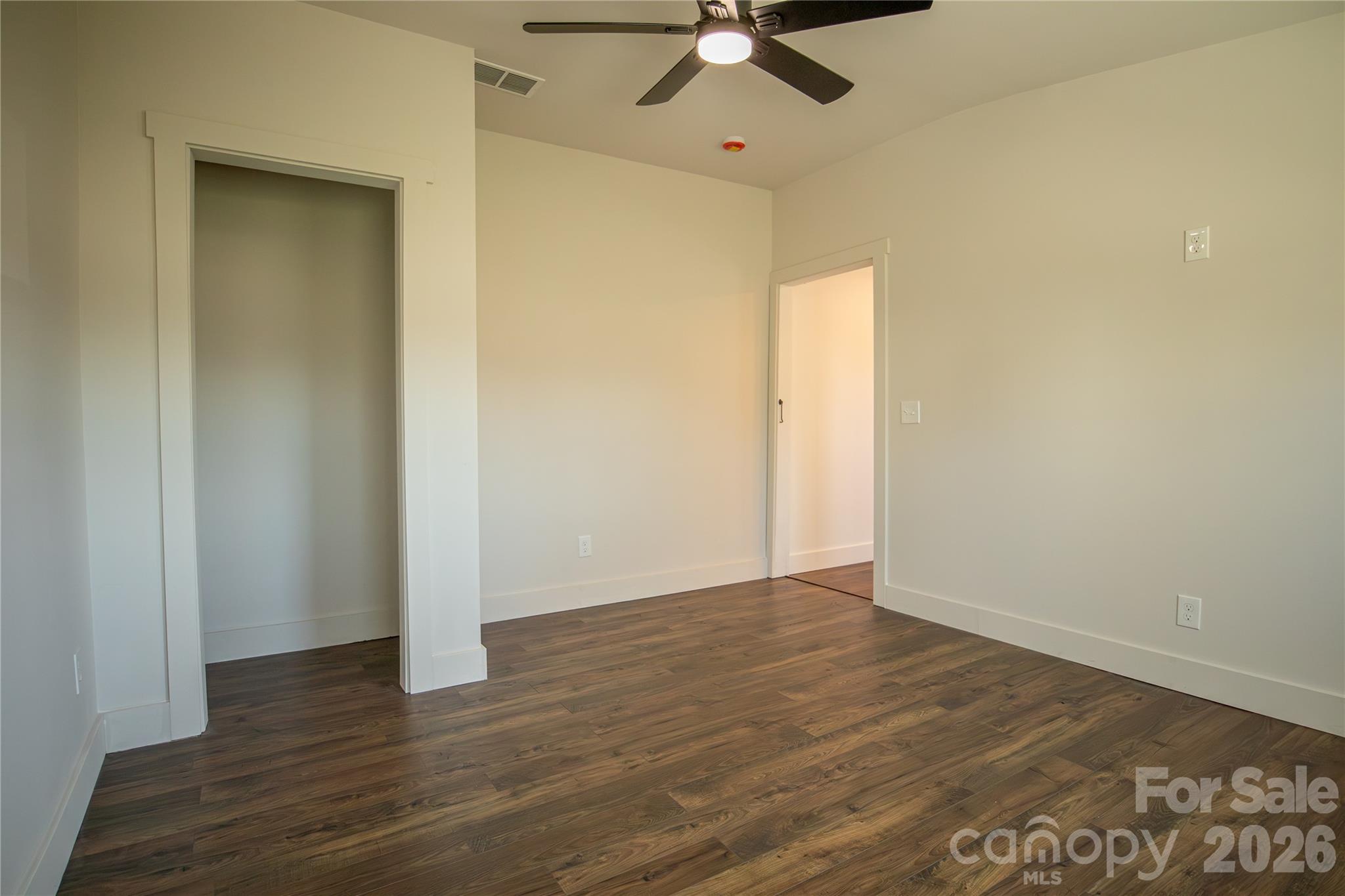 929 South Long Street Salisbury, NC 28144 - Photo 28 of 30 a view of an empty room with wooden floor