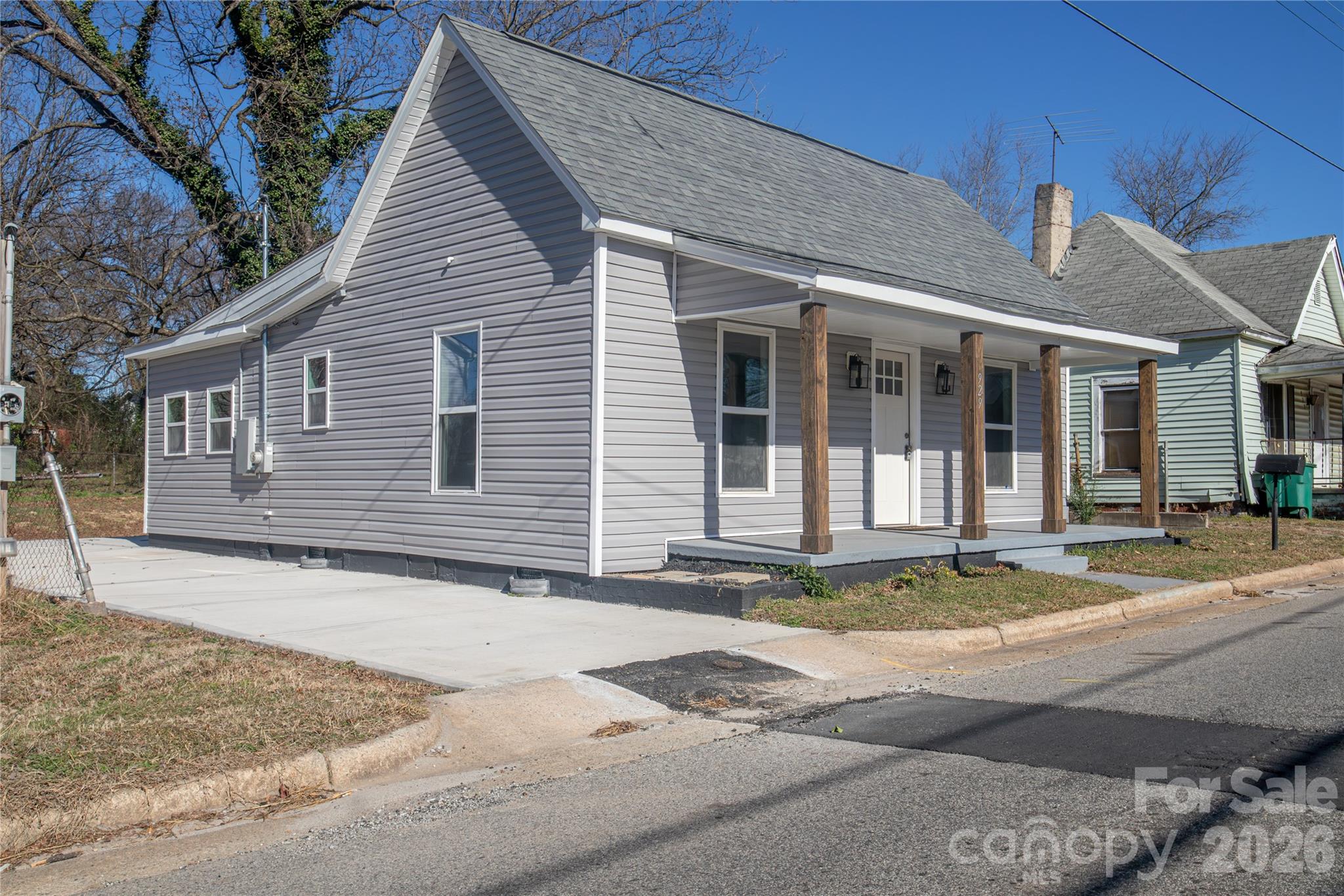 929 South Long Street Salisbury, NC 28144 - Photo 4 of 30 a view of a white house with a large windows
