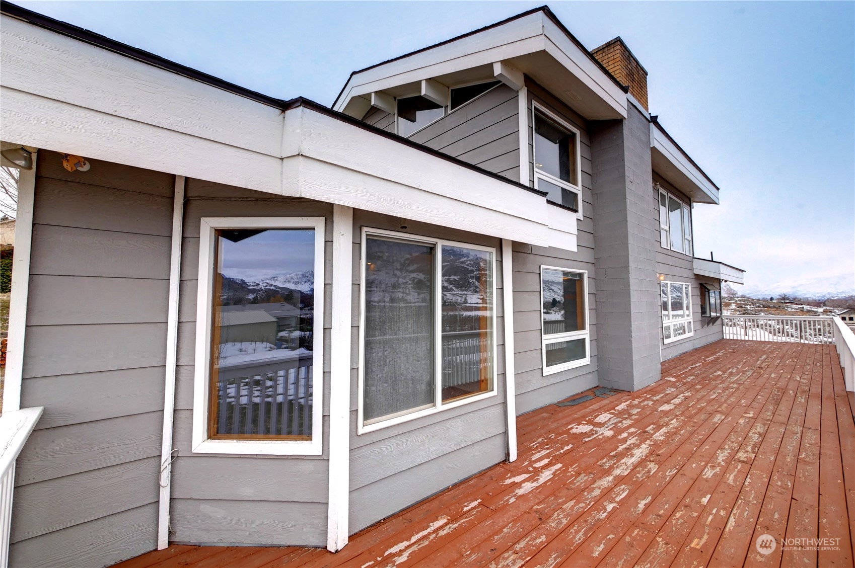 10 Sunrise Heights Road Malott, WA 98840 - Photo 12 of 40 a view of a house with a wooden deck