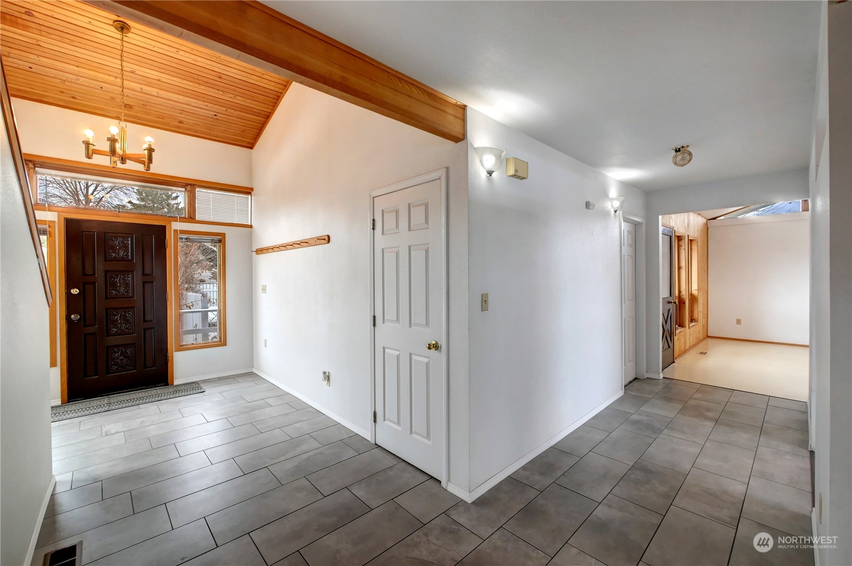 10 Sunrise Heights Road Malott, WA 98840 - Photo 16 of 40 a view of a hallway with wooden shelves