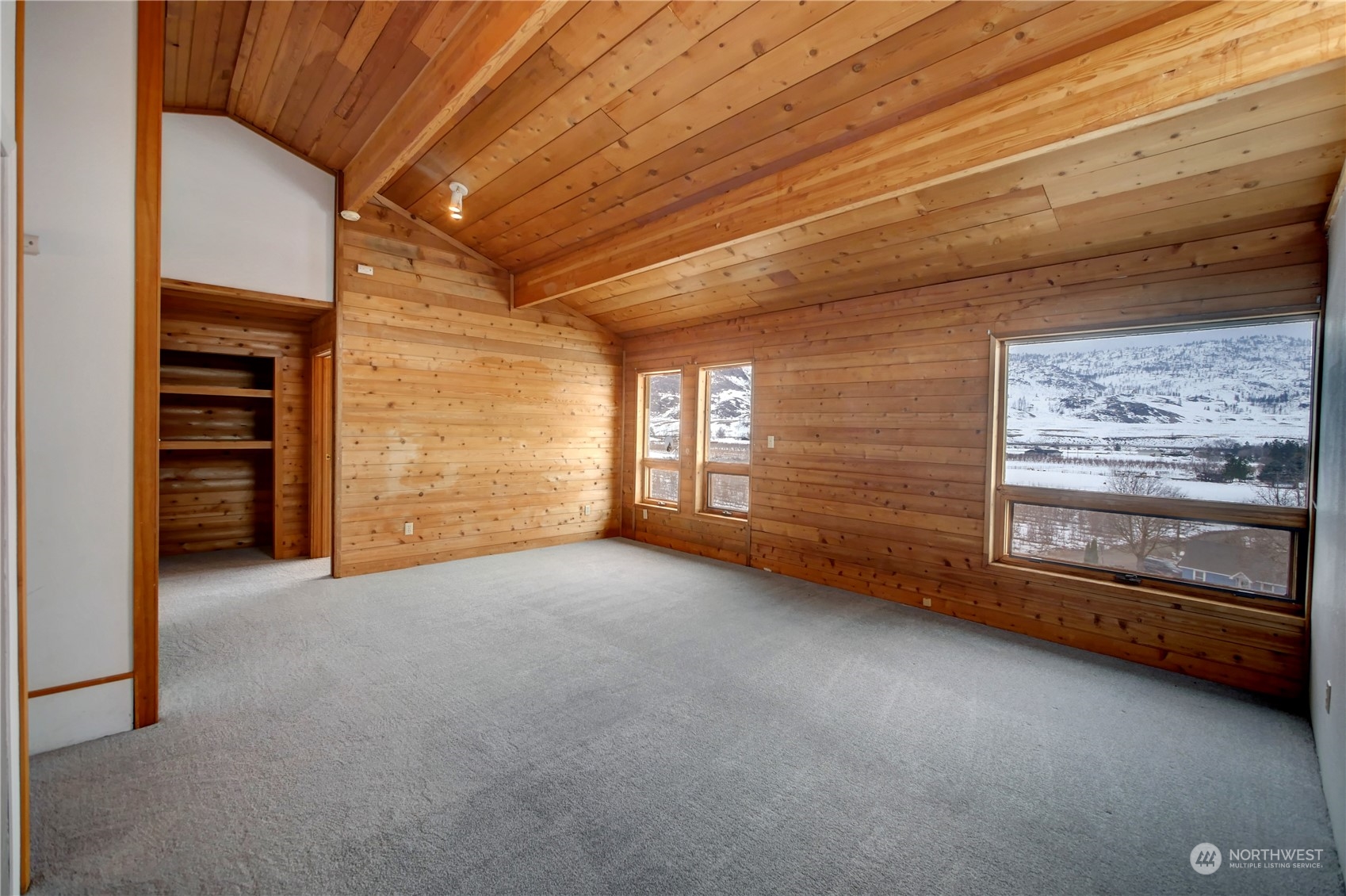 10 Sunrise Heights Road Malott, WA 98840 - Photo 32 of 40 a view of an empty room with a fireplace