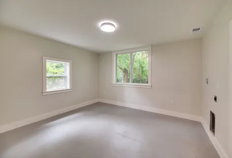 an empty room with windows