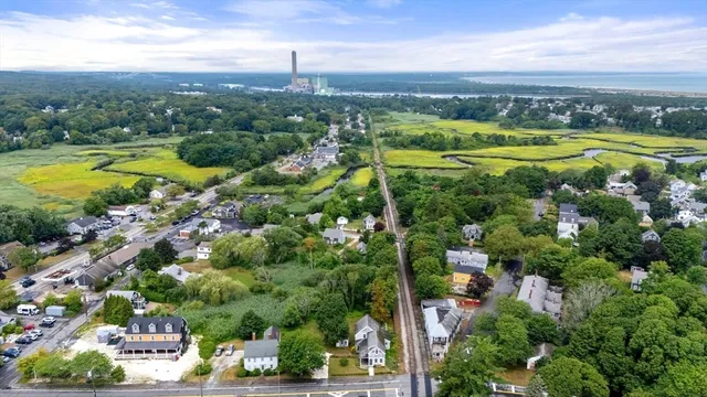 a view of a city with mountains in the background