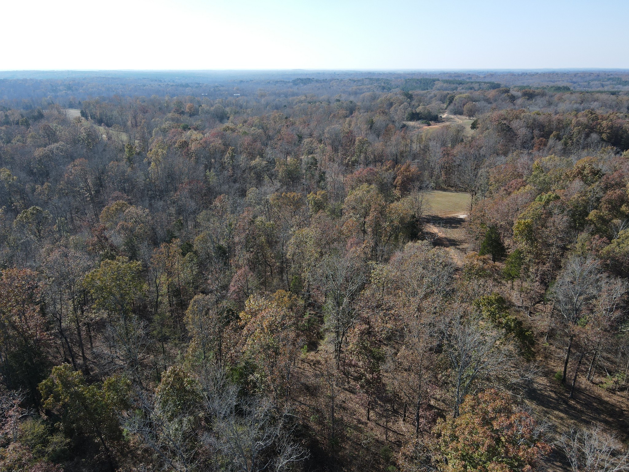 0 McEarl Road Huron, TN 38345 - Photo 15 of 39 an aerial view of house with yard and mountain view in back
