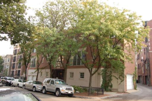 917 West Roscoe Street, Unit D Chicago, IL 60657 - Photo 1 of 1 a car parked on the side of a street