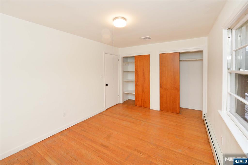 60 Poplar Avenue Hackensack, NJ 07601 - Photo 14 of 21 a view of an empty room