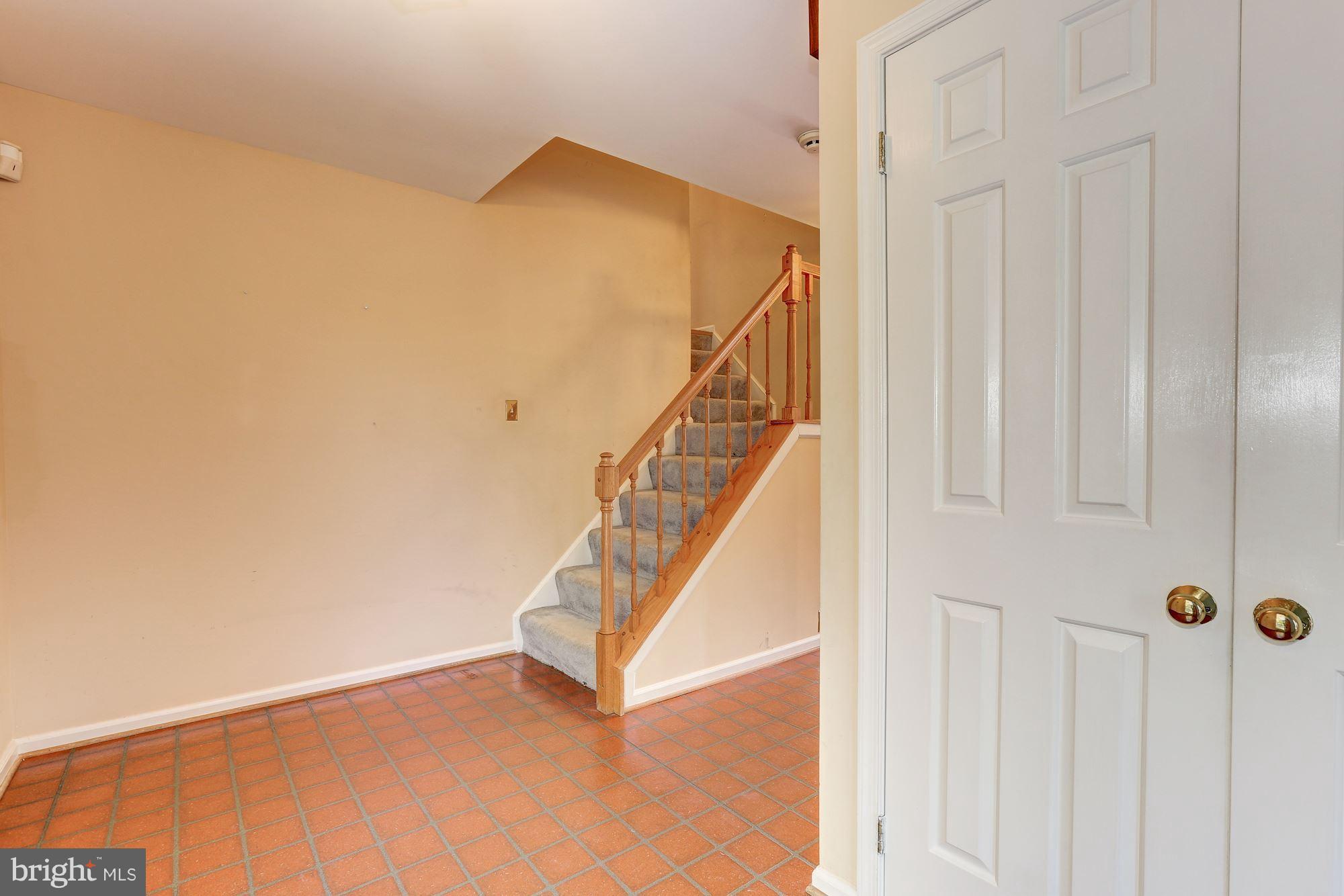 1930 Autumn Ridge Circle Silver Spring, MD 20906 - Photo 3 of 30 Entry foyer with coat closet, stair, powder room