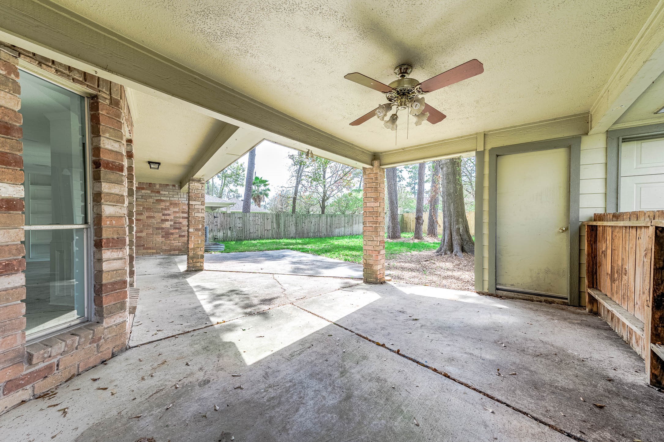 17627 Terrawren Lane Spring, TX 77379 - Photo 29 of 30 a view of a porch with wooden floor and a fireplace