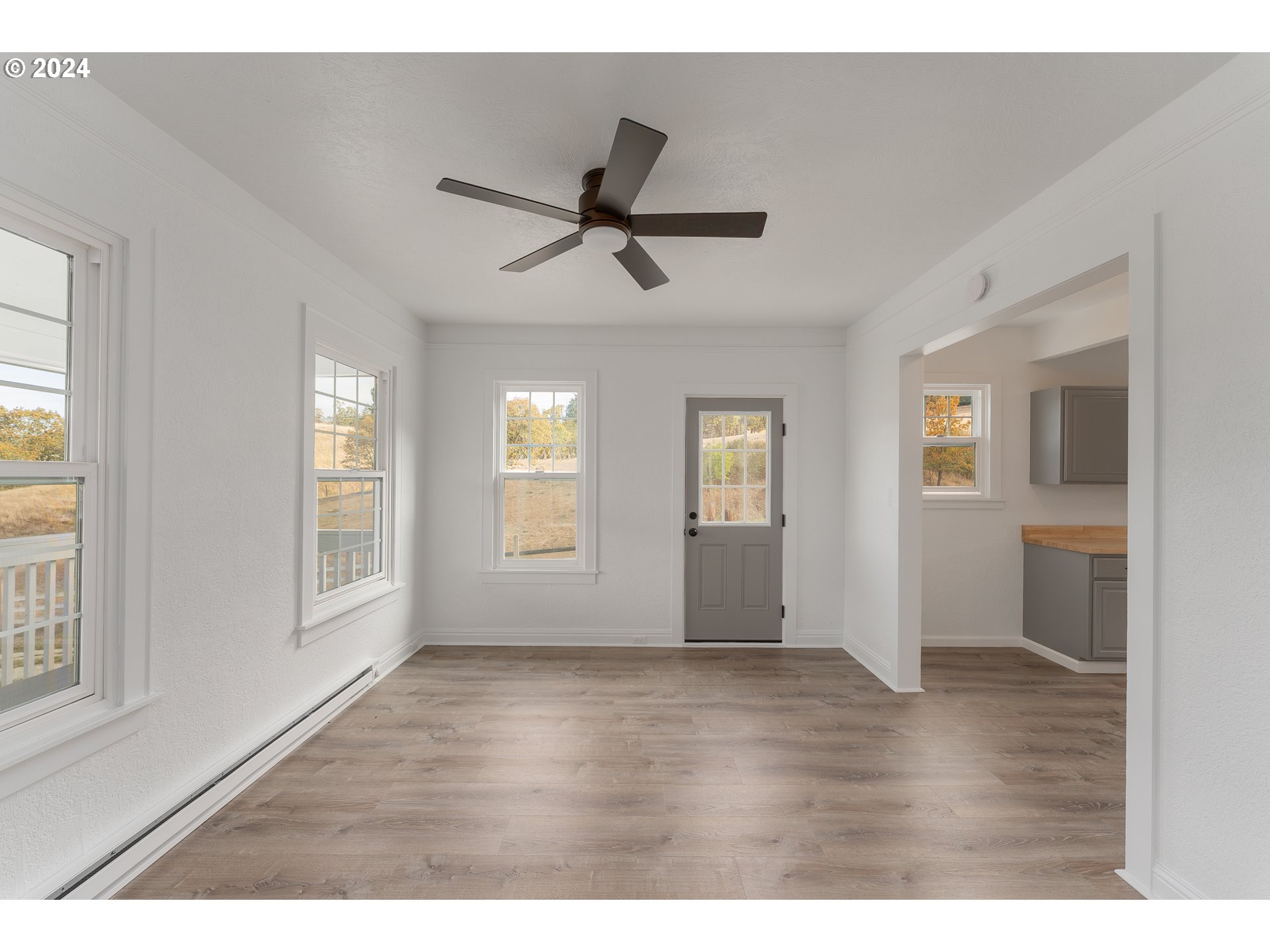 754 Glenbrook Loop Road Riddle, OR 97469 - Photo 11 of 45 a view of an empty room with a window