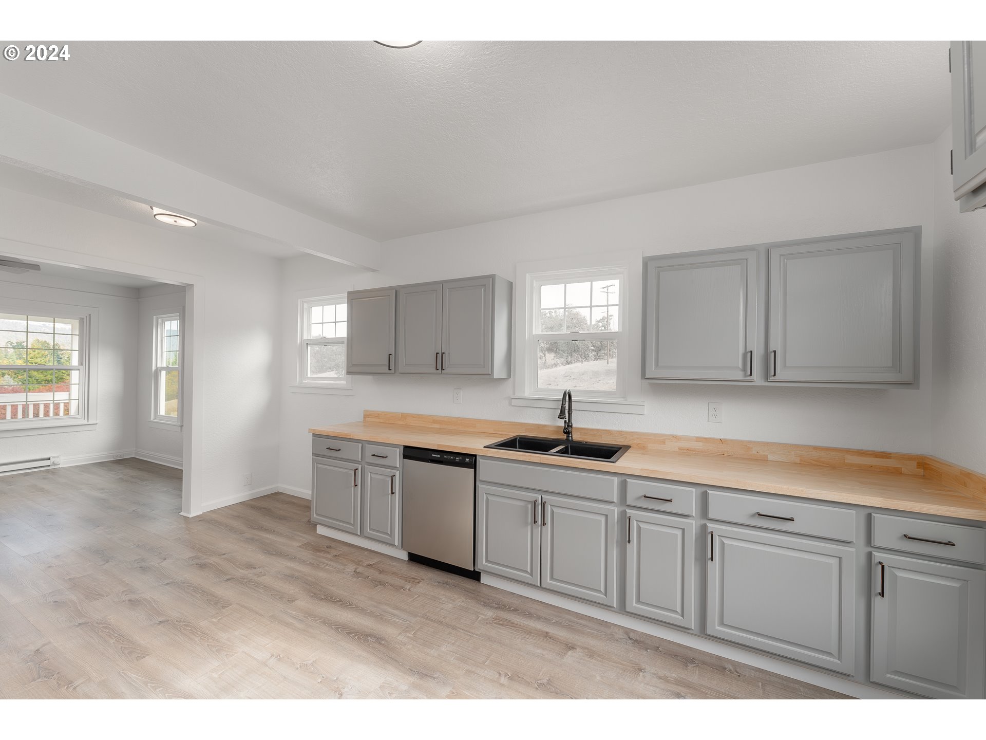 754 Glenbrook Loop Road Riddle, OR 97469 - Photo 14 of 45 a kitchen with sink and cabinets