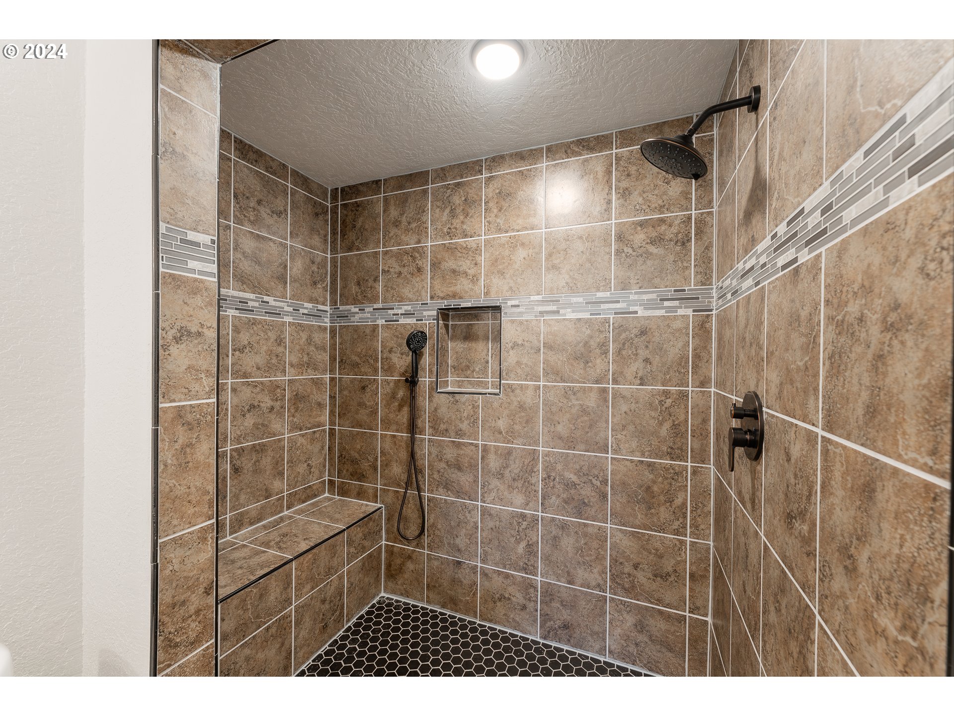 754 Glenbrook Loop Road Riddle, OR 97469 - Photo 28 of 45 a bathroom with a shower