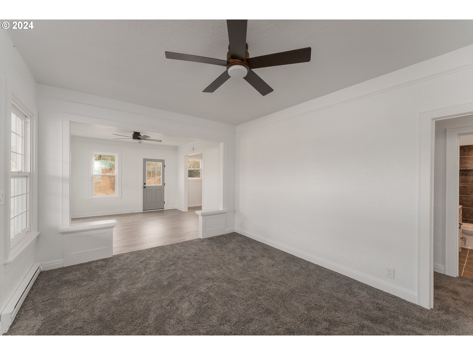 754 Glenbrook Loop Road Riddle, OR 97469 - Photo 10 of 45 a view of empty room with window and ceiling fan