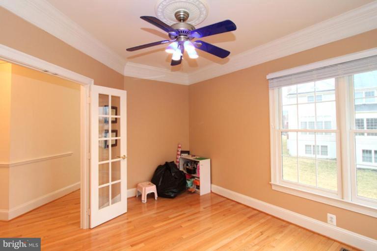 14311 Bubbling Spring Road Boyds, MD 20841 - Photo 7 of 23 a view of an empty room with a window