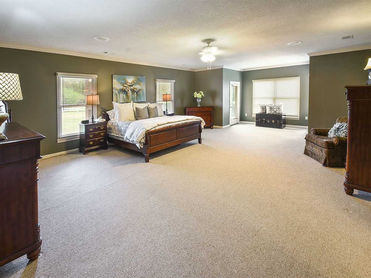 890 South Collierville Arlington Road Collierville, TN 38017 - Photo 16 of 24 This master is 30 x 20. It can accomadate not just a full bedroom suite but also a nice private sitting area. Huge walk in closet. There are plenty of options with this home. Before entering this master there is another large sitting area. See next photo