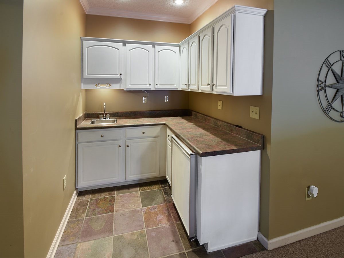 890 South Collierville Arlington Road Collierville, TN 38017 - Photo 18 of 24 Under counter fridge, sink and plenty of counter space for a microwave. Morning Coffee station, movie snacks?