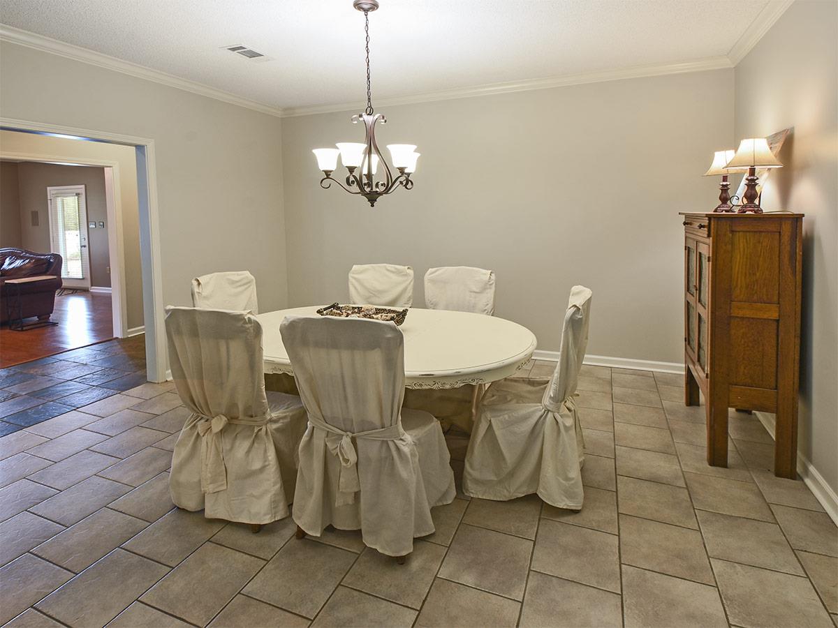 890 South Collierville Arlington Road Collierville, TN 38017 - Photo 21 of 24 Oops, this should of been right after the kitchen pictures. Large breakfast table, no problem. There is also a lunch counter opposite this area. Dont miss the drone video attached so you can really appreciate these 7+ acres in the Collierville Reserve!
