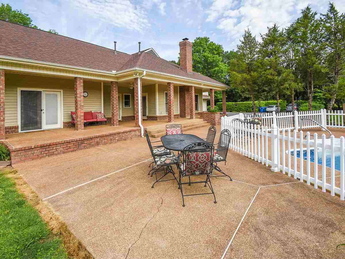 890 South Collierville Arlington Road Collierville, TN 38017 - Photo 4 of 24 Patio, pool, & porch. Pool liner 2 years old with secured gate for little people. Fence also protects and secures areas for pets. The summer heat is upon us and everyone needs a place to cool down.