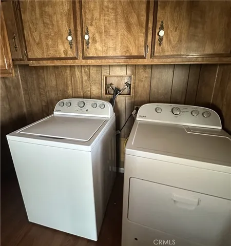 a view of entryway with wooden wall