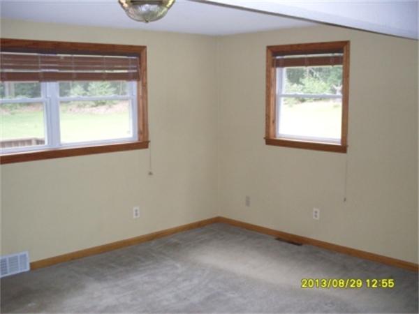 730 N Road Westfield, MA 01085 - Photo 7 of 10 an empty room with a window