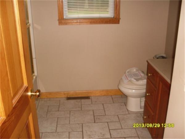 730 N Road Westfield, MA 01085 - Photo 9 of 10 a bathroom with a toilet and a shower
