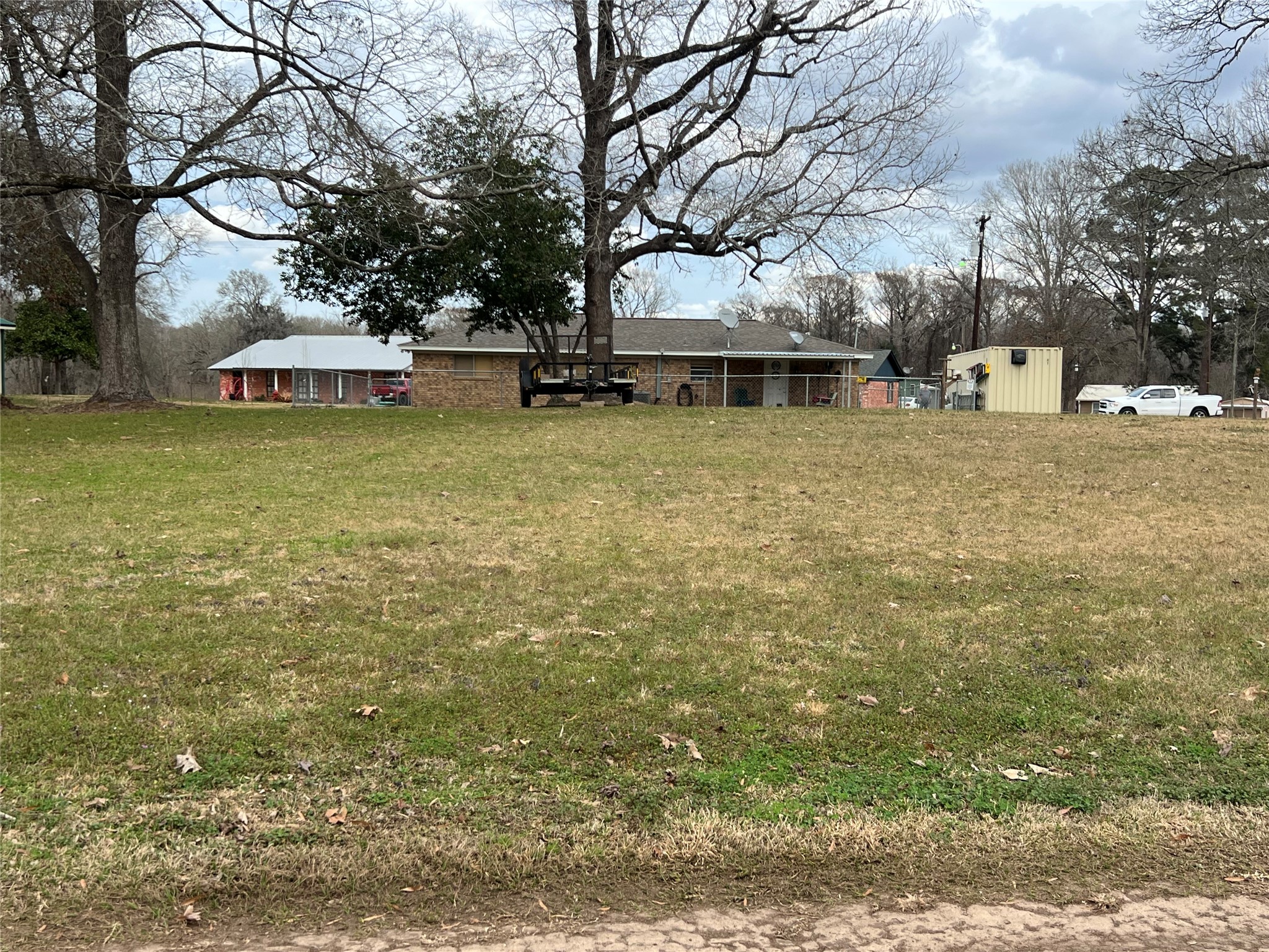 101 Vickie Lane Shepherd, TX 77371 - Photo 16 of 29 a view of a house with a yard