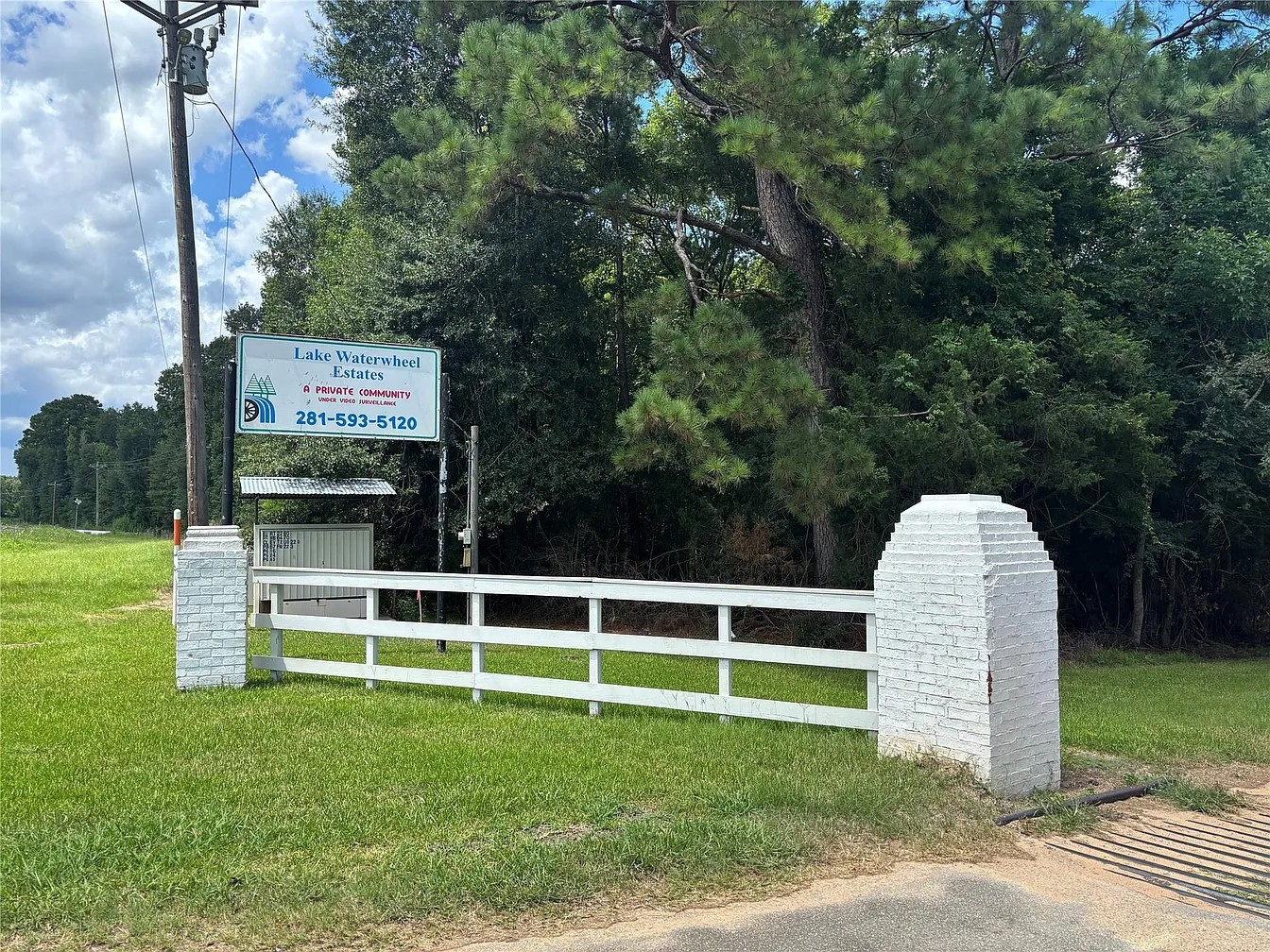 101 Vickie Lane Shepherd, TX 77371 - Photo 20 of 29 a view of a wooden fence and a big yard