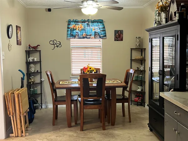 a view of a dining room with furniture