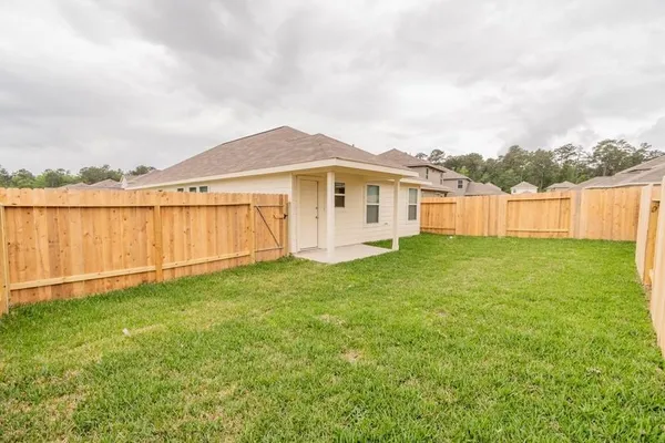 $1,610 | 504 Meadow Park Lane, Willis, TX 77378