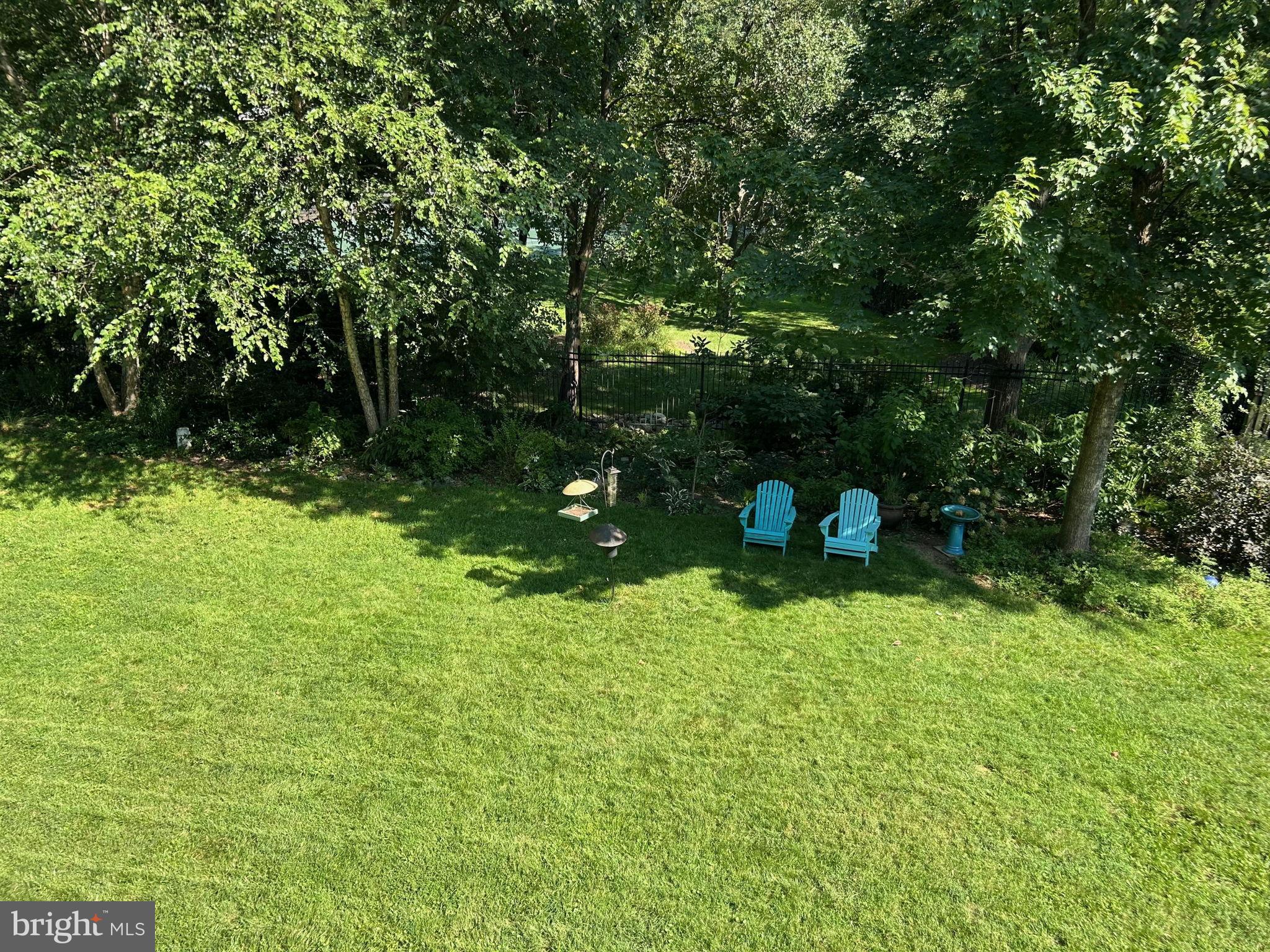 9817 Conestoga Way Potomac, MD 20854 - Photo 13 of 35 a front view of a house with a yard