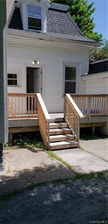 19 Elizabeth Street, Unit 1 Port Jervis, NY 12771 - Photo 12 of 16 a view of backyard with deck and wooden floor