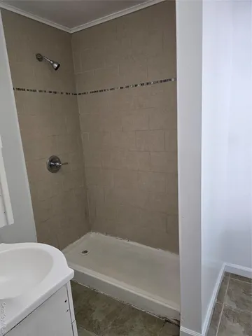 a bathroom with a sink mirror vanity and toilet