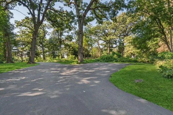 a view of backyard with green space