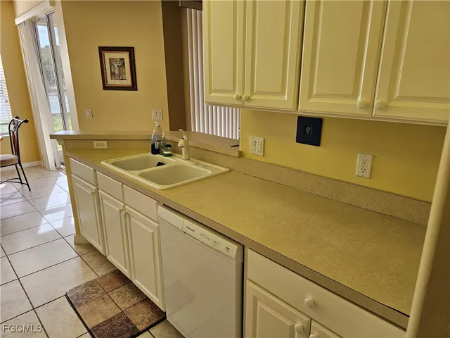 a kitchen with a stove and a microwave