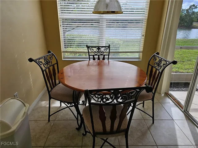 a view of a room with a table and chair