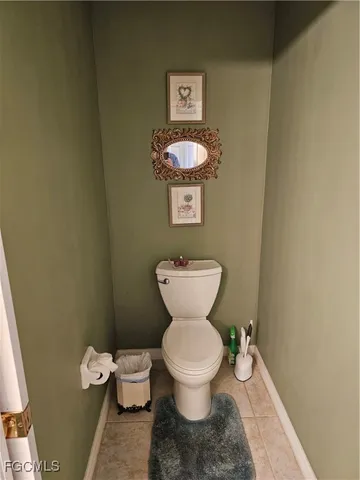 a view of a chairs and table in patio