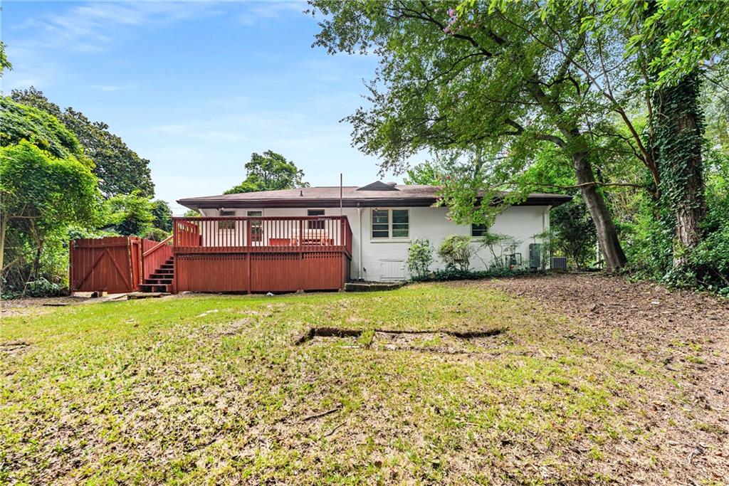 1469 Clairmont Road Decatur, GA 30033 - Photo 23 of 24 a view of a house with backyard and garden