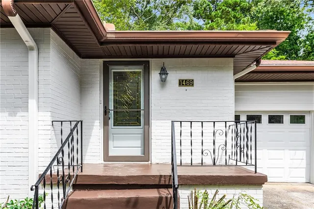 a view of front door and deck
