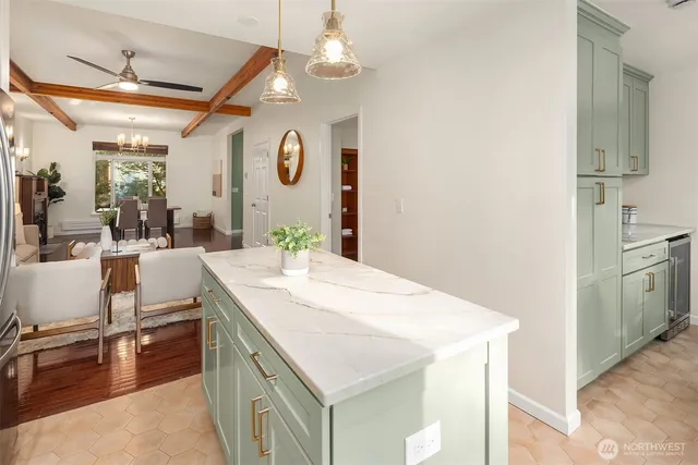 a bathroom with a sink a mirror and a bathtub