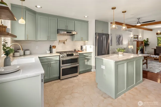 a kitchen with a sink stove and refrigerator