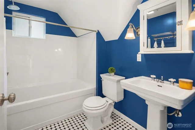 a bathroom with a sink and a toilet