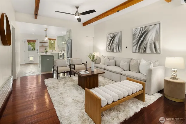 a living room with furniture and a rug
