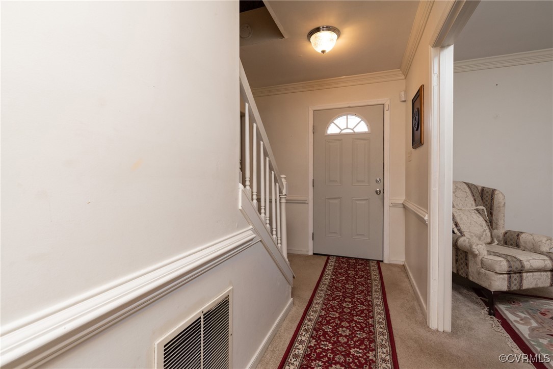 5604 Monguy Road Charles City, VA 23030 - Photo 11 of 49 Foyer entrance featuring visible vents, baseboards