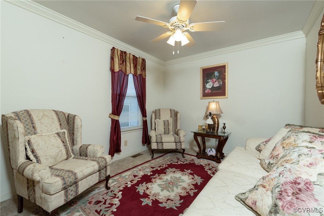 5604 Monguy Road Charles City, VA 23030 - Photo 12 of 49 Living room with baseboards, carpet, ornamental mo
