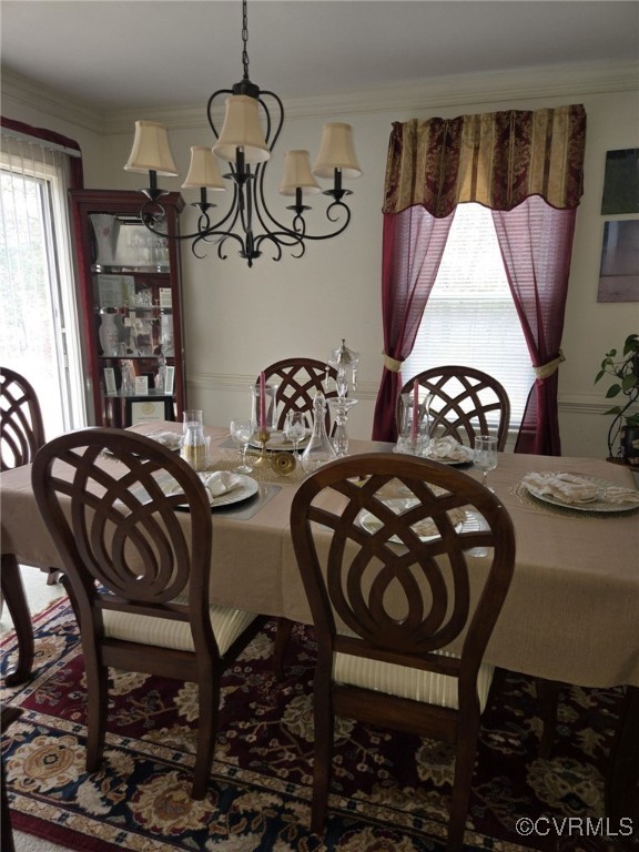 5604 Monguy Road Charles City, VA 23030 - Photo 22 of 49 Dining area featuring an inviting chandelier and o