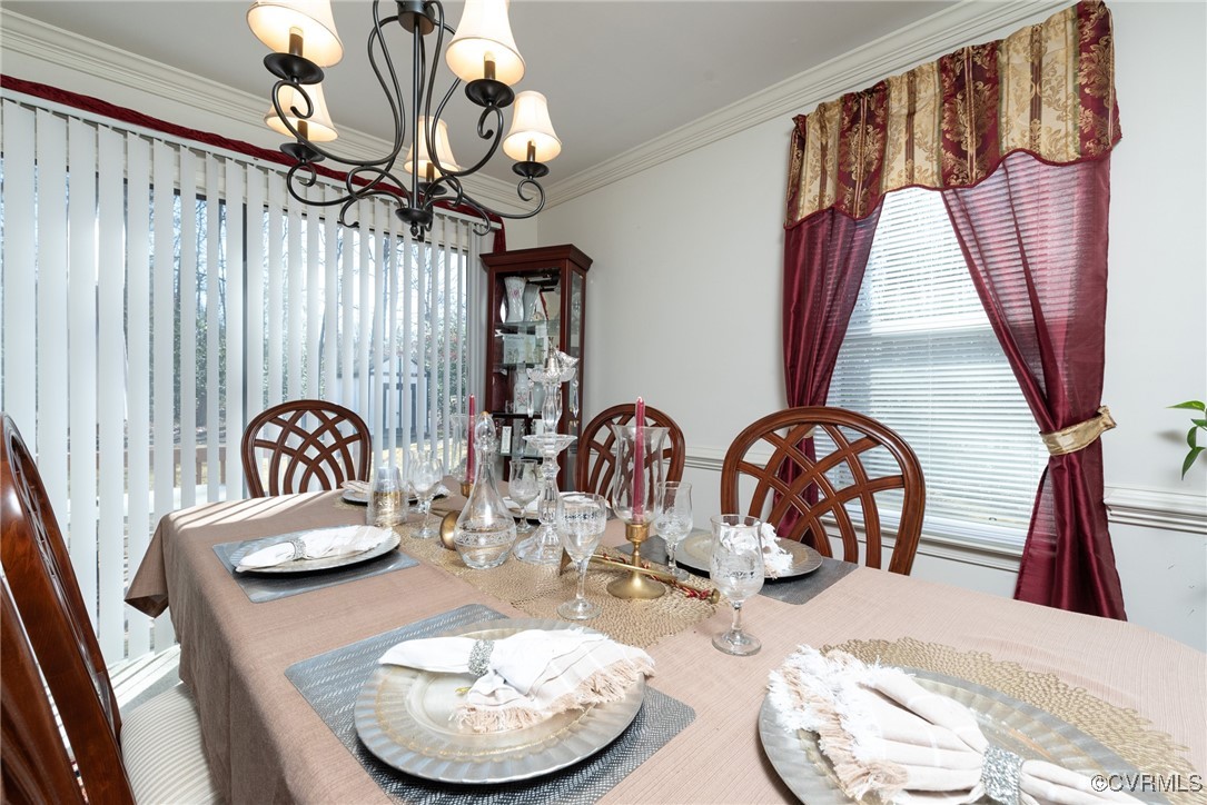 5604 Monguy Road Charles City, VA 23030 - Photo 23 of 49 Dining area with crown molding, a healthy amount o
