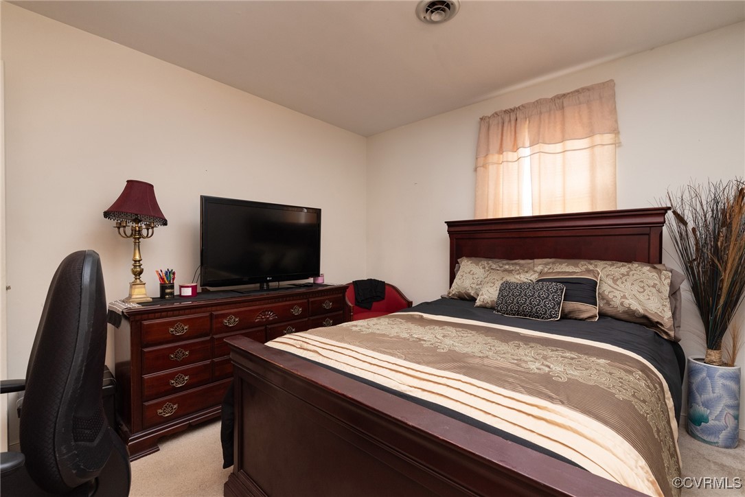 5604 Monguy Road Charles City, VA 23030 - Photo 28 of 49 Bedroom 2 featuring light colored carpet and visib
