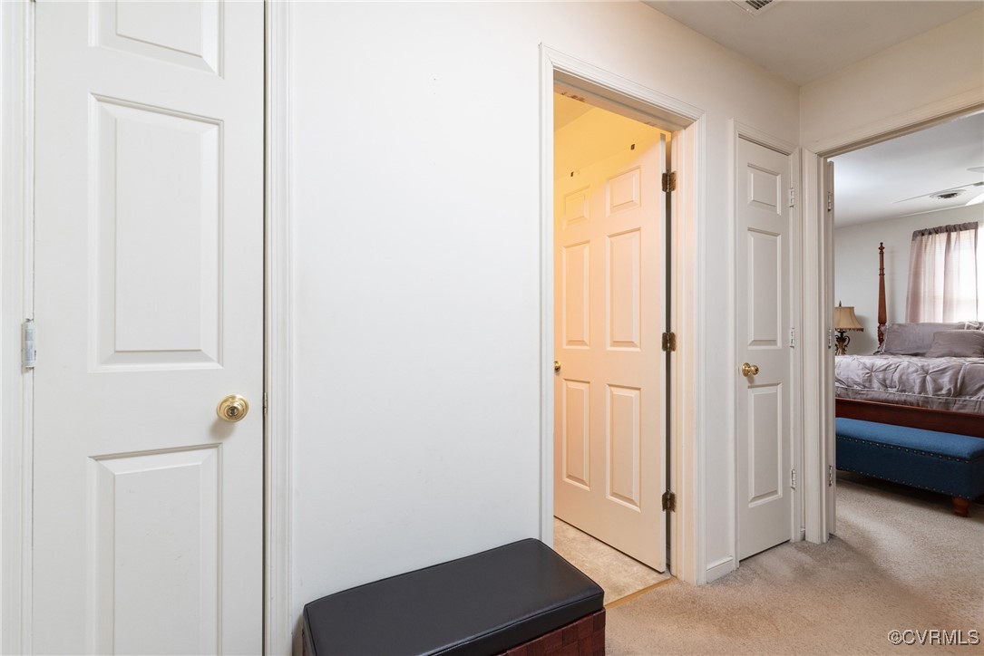 5604 Monguy Road Charles City, VA 23030 - Photo 31 of 49 Hallway featuring light carpet