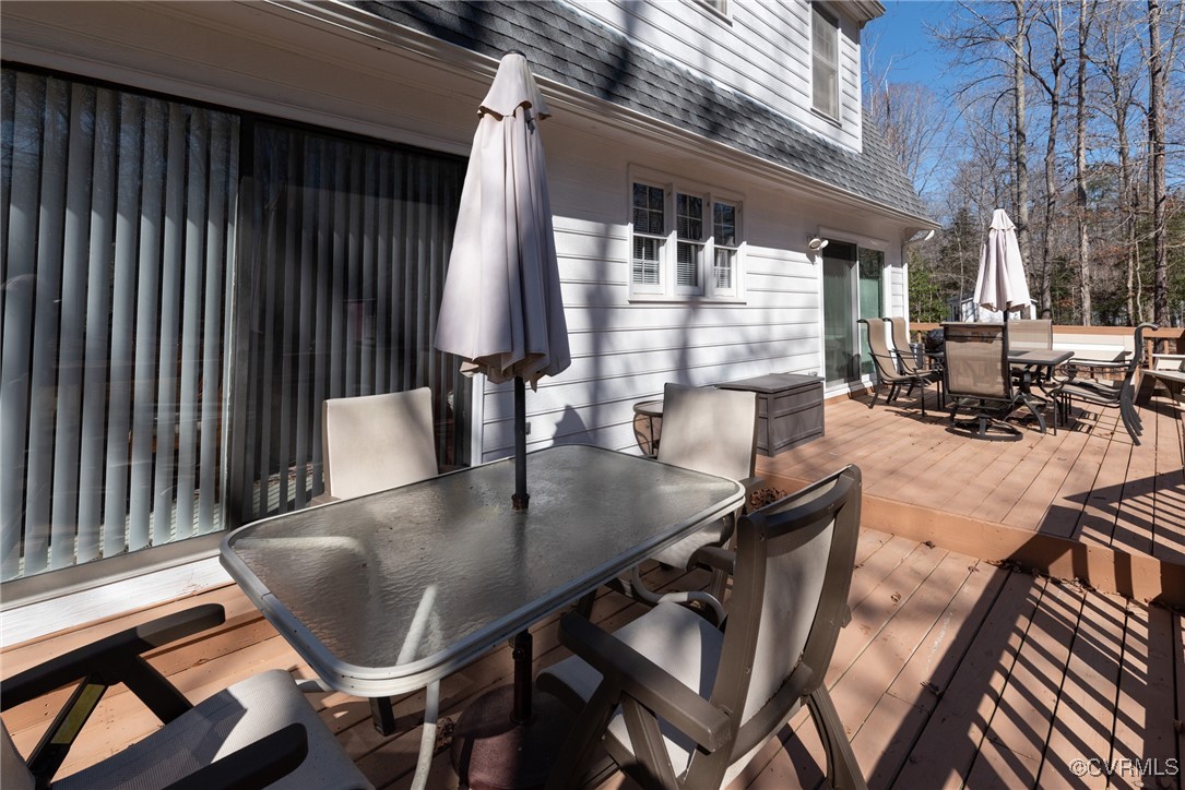 5604 Monguy Road Charles City, VA 23030 - Photo 44 of 49 Wooden terrace with outdoor dining area