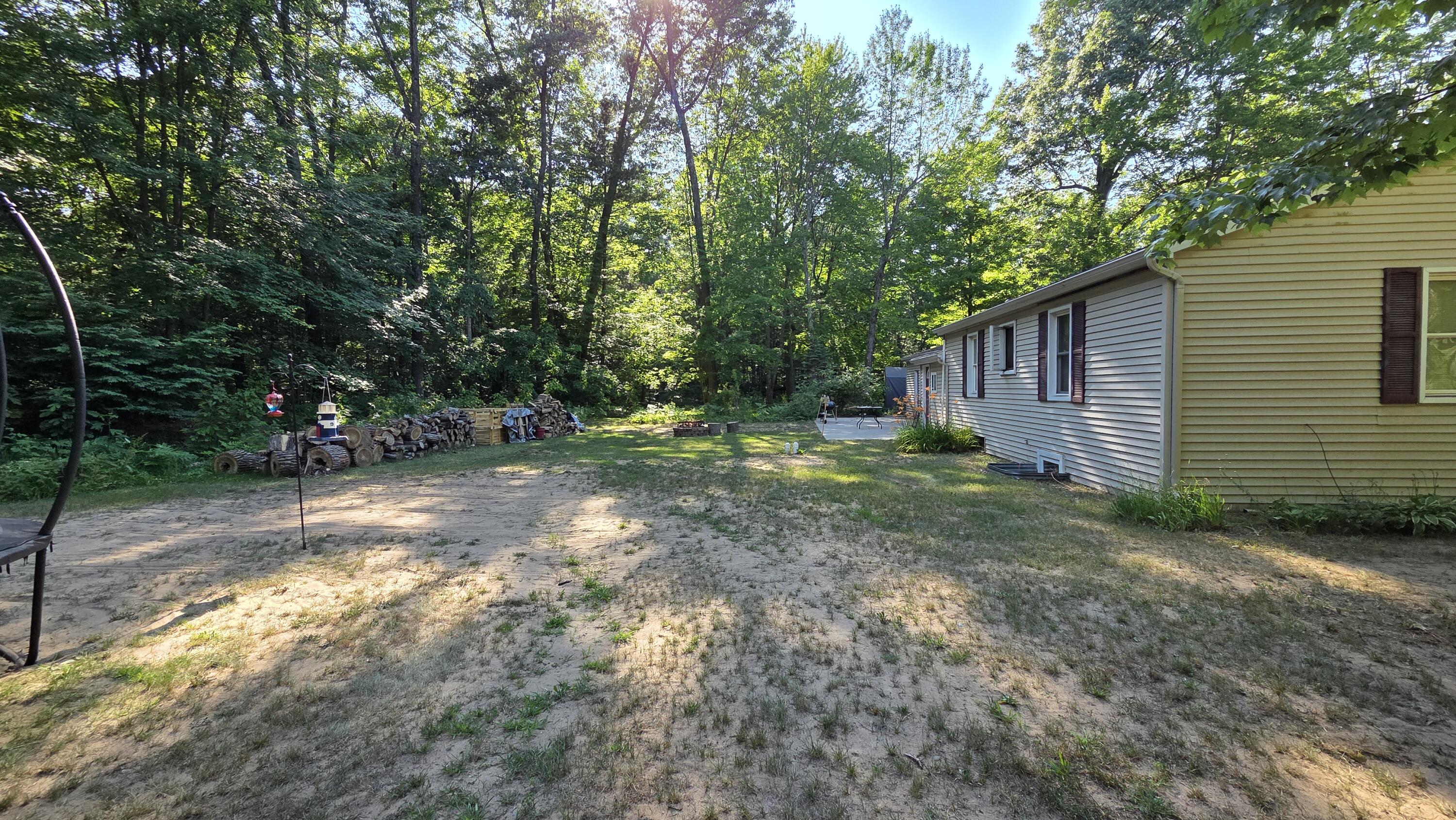 6141 Bell Road Whitehall, MI 49461 - Photo 8 of 33 Back yard