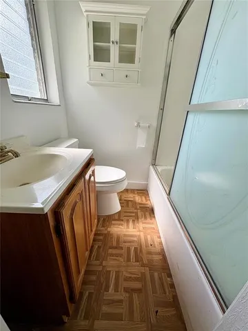 a bathroom with a sink and a toilet